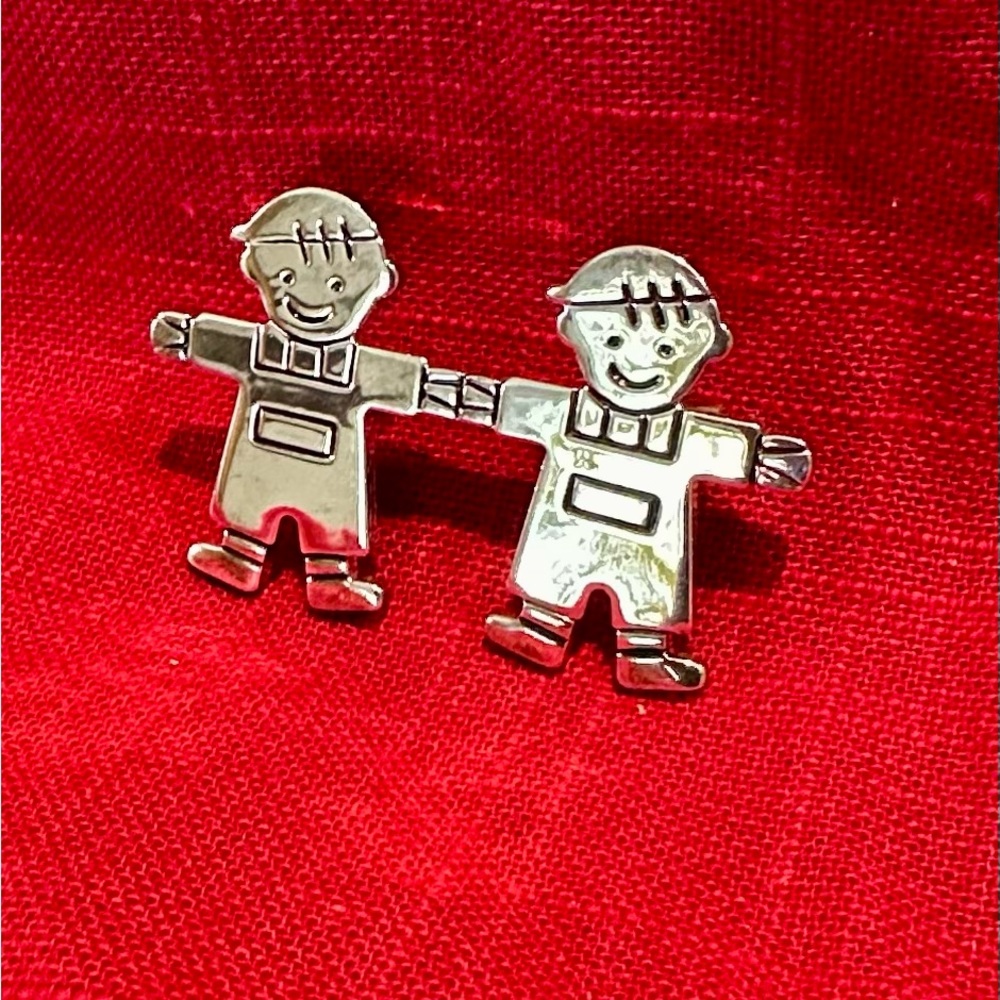 Silver tone “Brothers” brooch